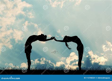 Couple Makes Yoga Poses At Sunset Picture. Image: 113708331