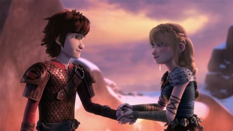 Hiccup and Astrid's moment of holding hands before they kiss from Dreamworks Dragons Race to ...