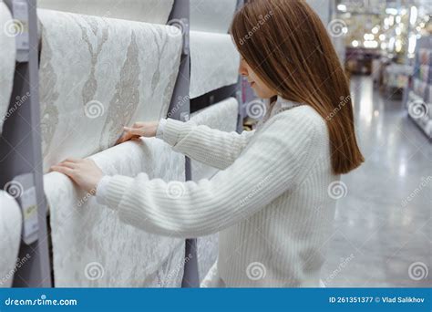 Young Woman Choose Wallpaper in Hardware Store. Home Design and Renovation Concept Stock Image ...