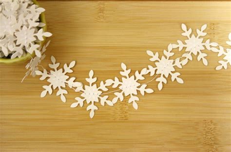 Items similar to White Paper Snowflake Garland - 9' on Etsy