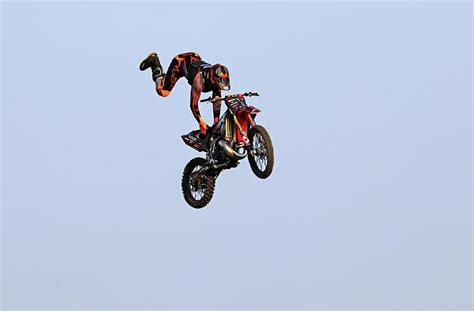 Dirt Bike Stunts - In The Air XIV Photograph by Debbie Oppermann | Pixels