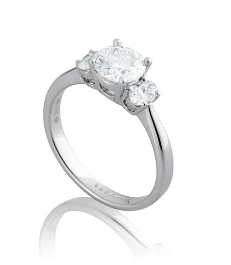 18ct White Gold Round & Oval Cut Three Stone Diamond Ring