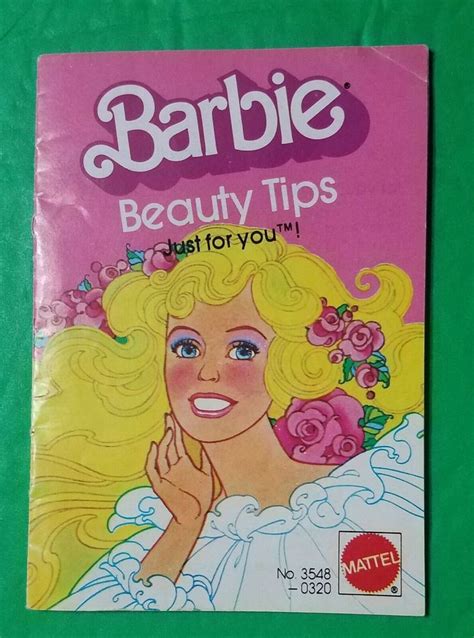 barbie beauty tips book on a green tablecloth with pink roses in her hair and the title barbie ...