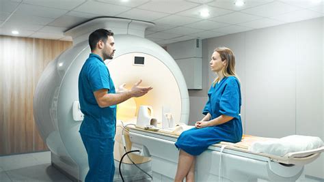 Mri Scanning Procedure Stock Photo - Download Image Now - MRI Scan, MRI Scanner, Technician - iStock