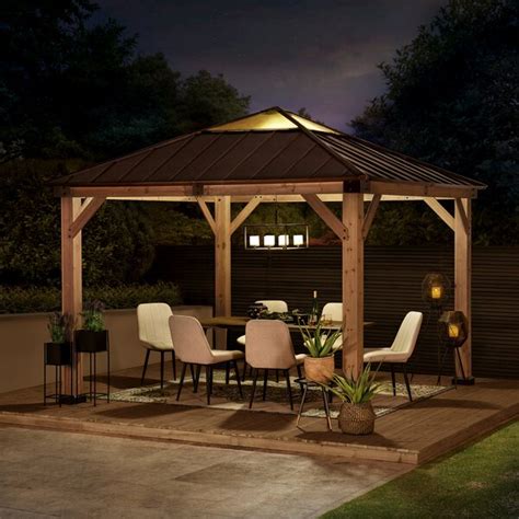 Sunjoy Brown 11 ft. x 11 ft. Patio Cedar Framed Polycarbonate Hip Roof Hardtop Gazebo & Reviews ...