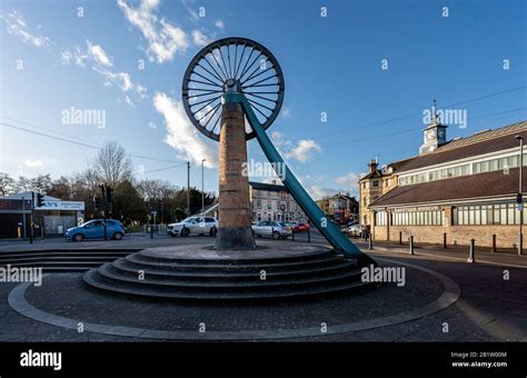 Restored mining pit wheel outside the Radstock Museum. North Somerset Coalfield Heritage Museum ...