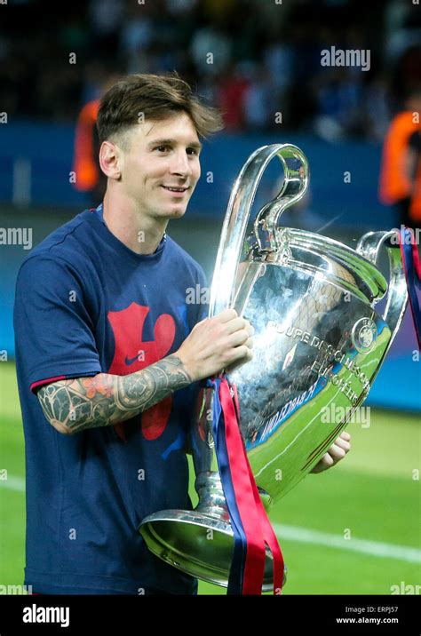 Berlin, Germany. 6th June, 2015. Lionel Messi of FC Barcelona holds the trophy after the UEFA ...