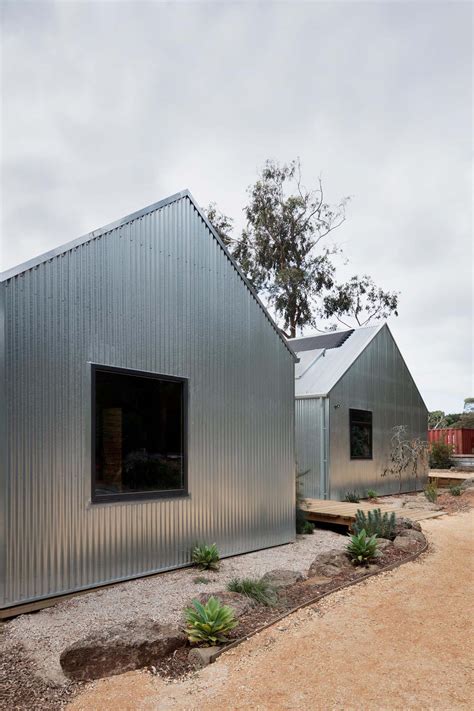 This Home Was Designed To Be Durable, So They Covered It In Corrugated Metal Siding