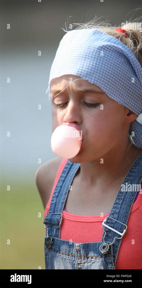 Blowing bubble gum hi-res stock photography and images - Alamy