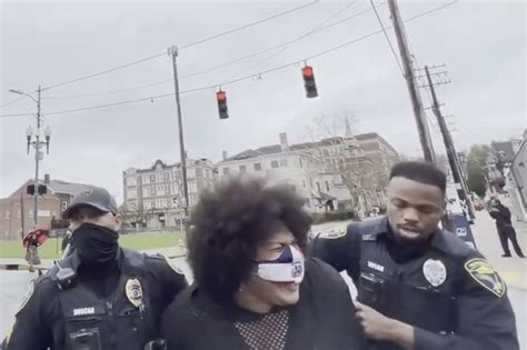 BLM protester punched by black cop at rally against police violence