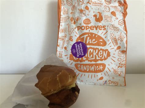 I tried Popeyes new twist on their iconic Blackened Chicken Sandwich - it's a healthier option ...