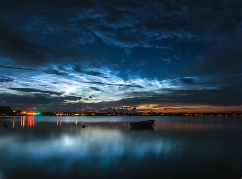 Shining Silver-Blue Clouds Captured in Night Sky Photo | Space