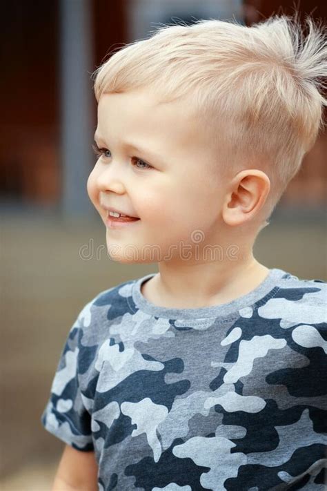 Portrait of a Cute Child Smiling in the Sun Stock Image - Image of cheerful, military: 244327687