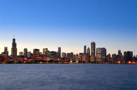 Chicago Skyline And Lake Michigan by Sir Francis Canker Photography