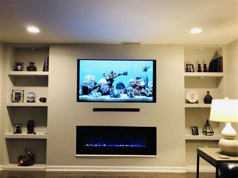 built in tv wall with fireplace - Oma Fry