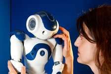 Robots that develop emotions in interaction with humans