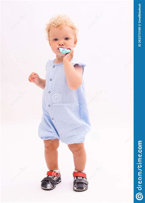 Baby Girl Cleans Her Milk Teeth Stock Photo - Image of toddler, full: 262273100