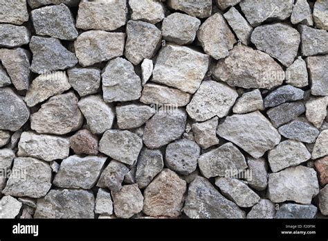 Background texture of gray rough granite stone wall Stock Photo - Alamy