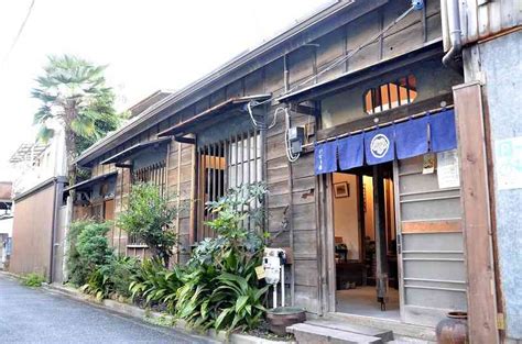 Century-old row house attached to bathhouse transformed into community space - Asia News ...