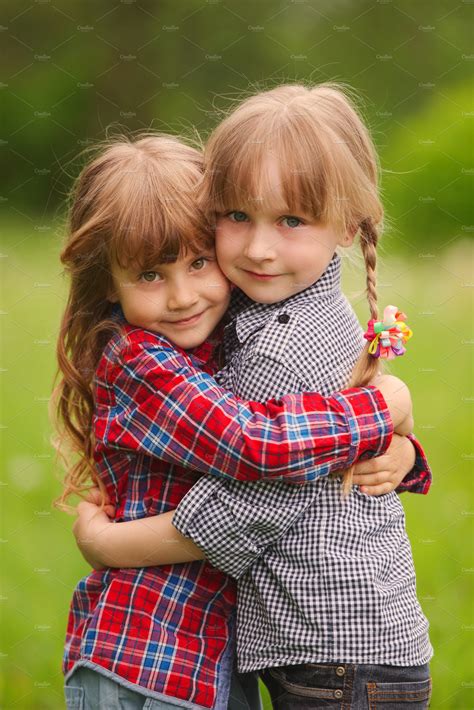 Two Little Girls Hugging