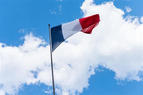 French flag waving in the wind 9254123 Stock Photo at Vecteezy