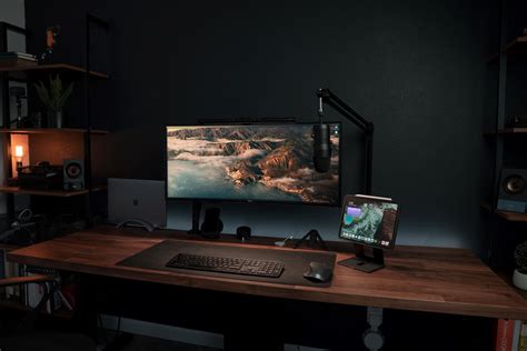 Stunning widescreen monitor setup with perfect lighting - Minimal Desk Setups