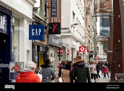 shops on busy royal avenue belfast city centre shopping area northern ireland uk Stock Photo - Alamy