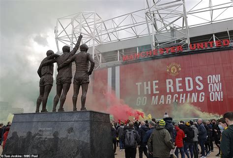 Manchester United fans force Liverpool match to be POSTPONED after hundreds of protestors BROKE ...