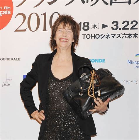 TOKYO – MARCH 18: Actress Jane Barkin holds her Hermes Birkin handbag during the France Film ...