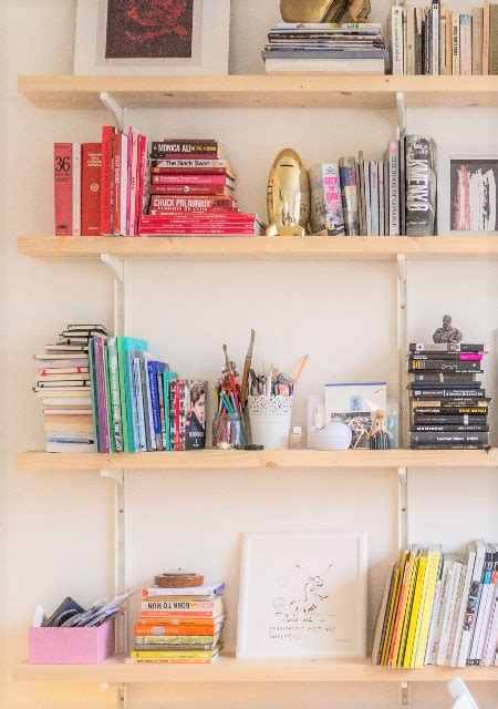 Bookshelf Organization by Color: Captivate with Your Books - Organized Apartment