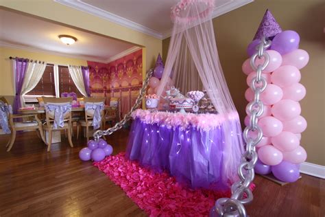 Balloon decor by front window and tulle with lights around table Princess Sofia Party, Disney ...