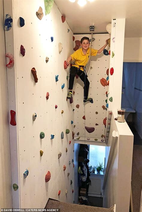 Savvy father creates incredible DIY climbing wall for his two sons in his stairwell | Daily Mail ...