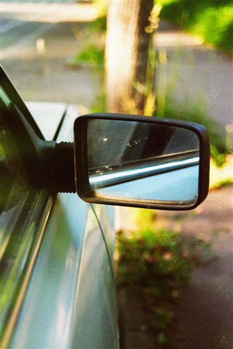 Close-Up Shot of a Broken Side Mirror · Free Stock Photo