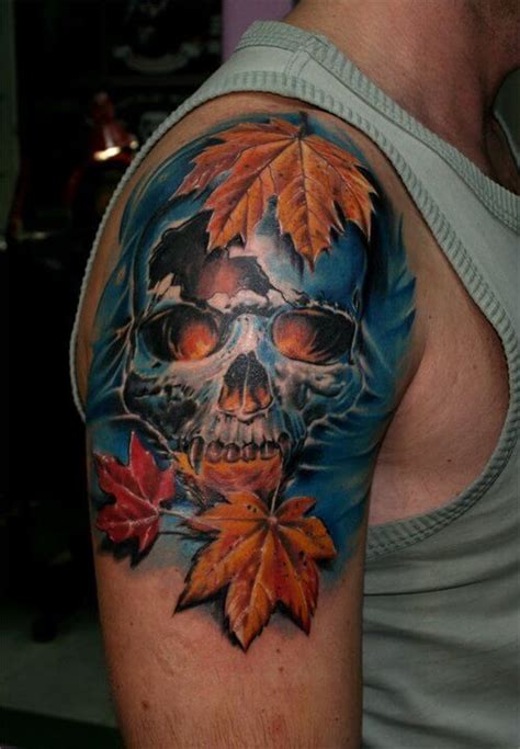 Amazing looking corrupted vampire skull tattoo on shoulder stylized with natural looking leaves ...