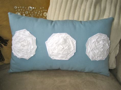 GraceAdkinsDesigns: Light Blue Lumbar Pillow with Three White Muslin Fabric Flowers