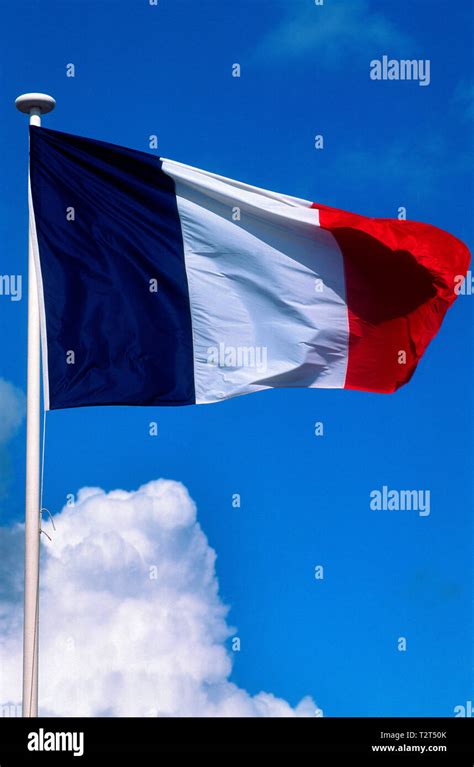 French flag waving in the wind Stock Photo - Alamy