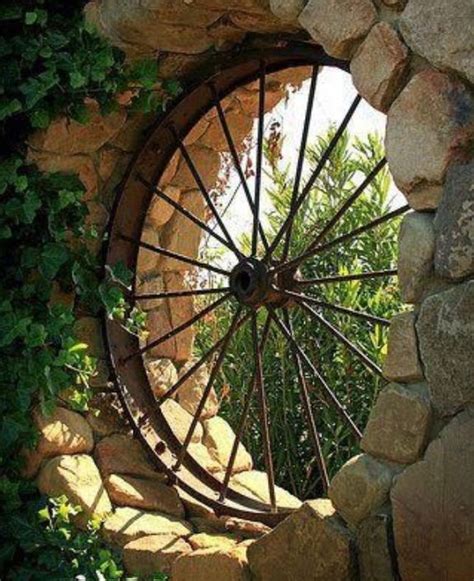 The 25+ best Wagon wheel garden ideas on Pinterest | Old wagons, Garden ideas for spring and ...