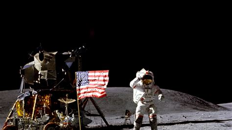 Neil Armstrong On The Moon Holding Flag