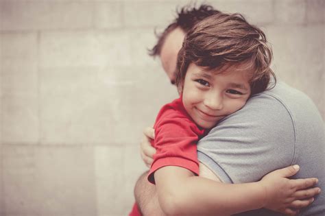 little boy hugging his dad - Morrison Child & Family Services