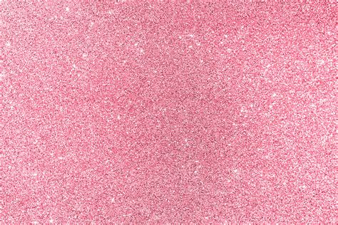 Pink glitter texture christmas abstract background. Shimmer light rose shiny. Photograph by Julien