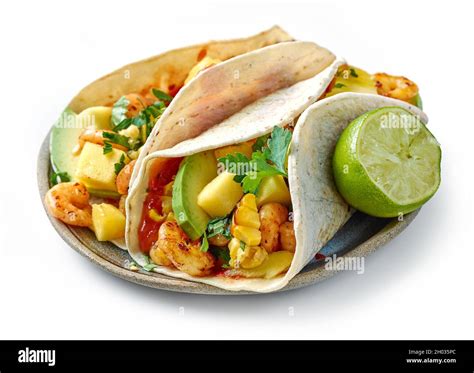 Plate of Mexican food Tacos isolated on white background Stock Photo - Alamy