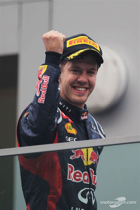 Race winner Sebastian Vettel, Red Bull Racing celebrates on the podium at Indian GP High-Res ...