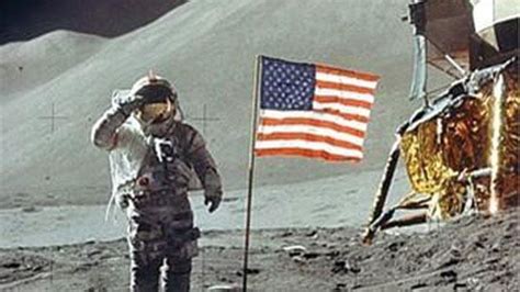 Neil Armstrong On The Moon Holding Flag