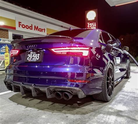 Purple Car Parked at Gas Station