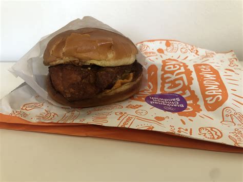 I tried Popeyes new twist on their iconic Blackened Chicken Sandwich - it's a healthier option ...