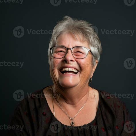 an older woman with glasses and a smile on her face generative ai 28386604 Stock Photo at Vecteezy