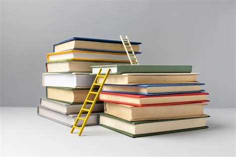 Free Photo | Front view of stacked books and ladders for education day