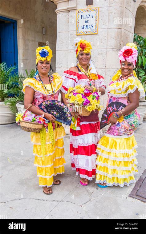 Cuban women with traditional clothing in old Havana Stock Photo - Alamy