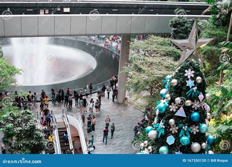 SINGAPORE - 21 DEC 2019: Tallest Christmas Tree Located in Jewel Changi Airport with MRT and ...