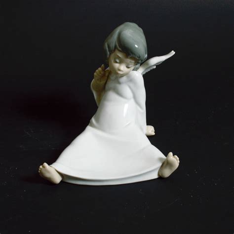 Lladró "Angel Wondering" Porcelain Figurine | EBTH